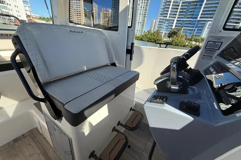  Yacht Photos Pics Interior of 2026 Navan C30 boat with modern controls and seating.