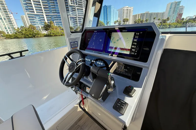  Yacht Photos Pics Interior of 2026 Navan C30 boat with modern navigation system and steering wheel.
