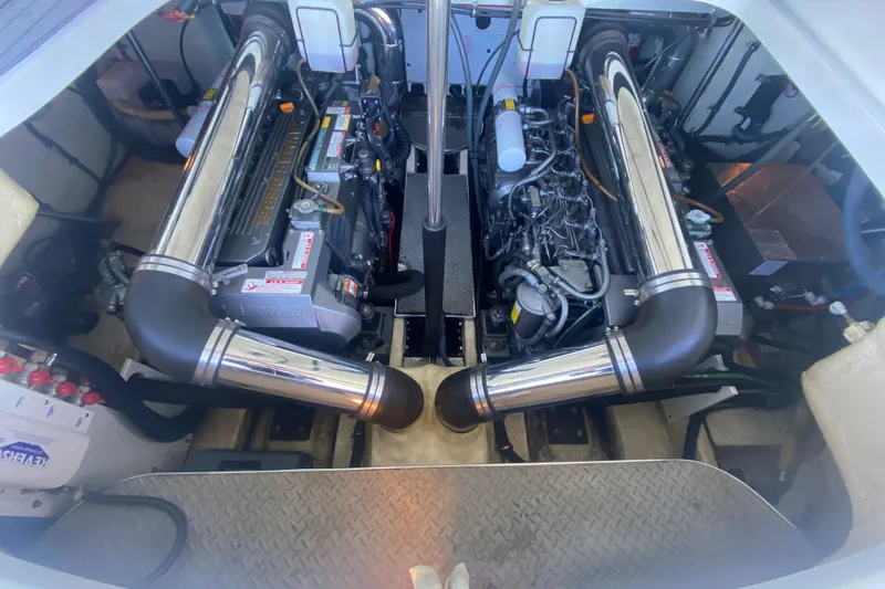  Yacht Photos Pics Engine compartment of a 2005 Formula 40 Performance Cruiser, showcasing dual engines and components.