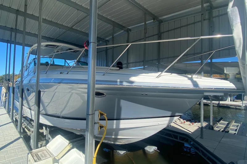  Yacht Photos Pics 2005 Formula 40 Performance Cruiser docked in a covered marina.