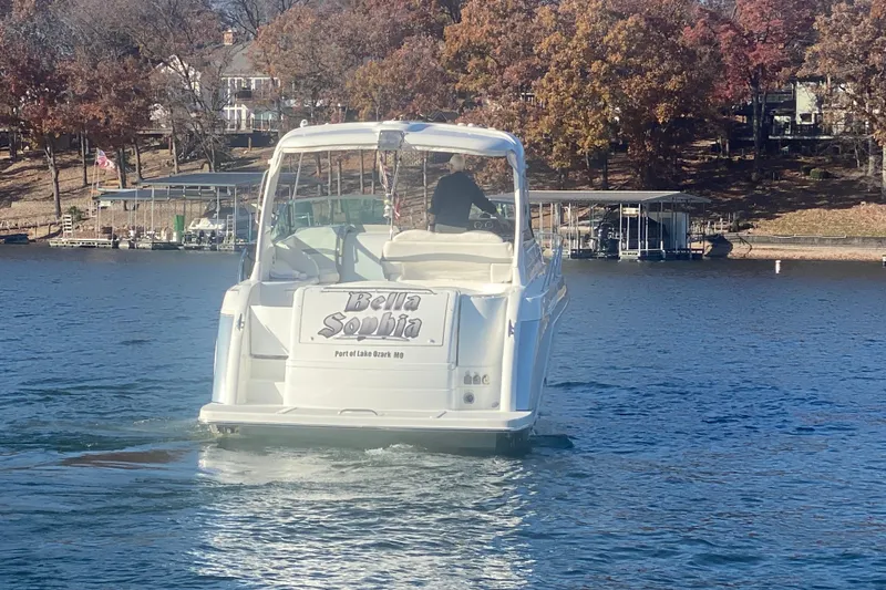  Yacht Photos Pics 2005 Formula 40 Performance Cruiser, "Bella Sophia," on a lake with autumn trees in the background.