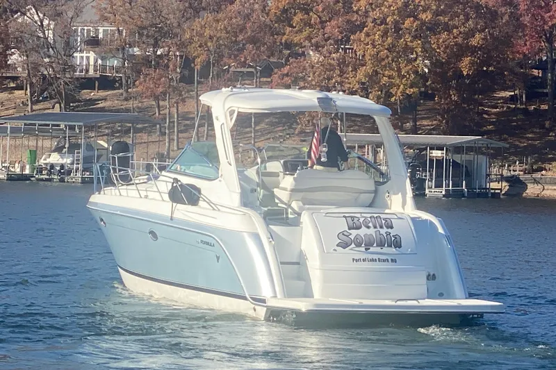  Yacht Photos Pics 2005 Formula 40 Performance Cruiser on a lake, autumn trees in background.