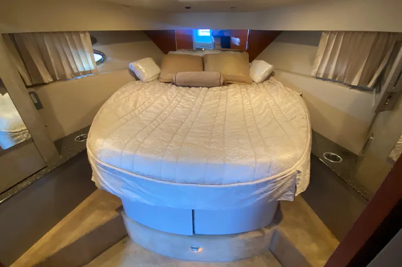  Yacht Photos Pics Luxurious bedroom interior of a 2005 Formula 40 Performance Cruiser yacht.