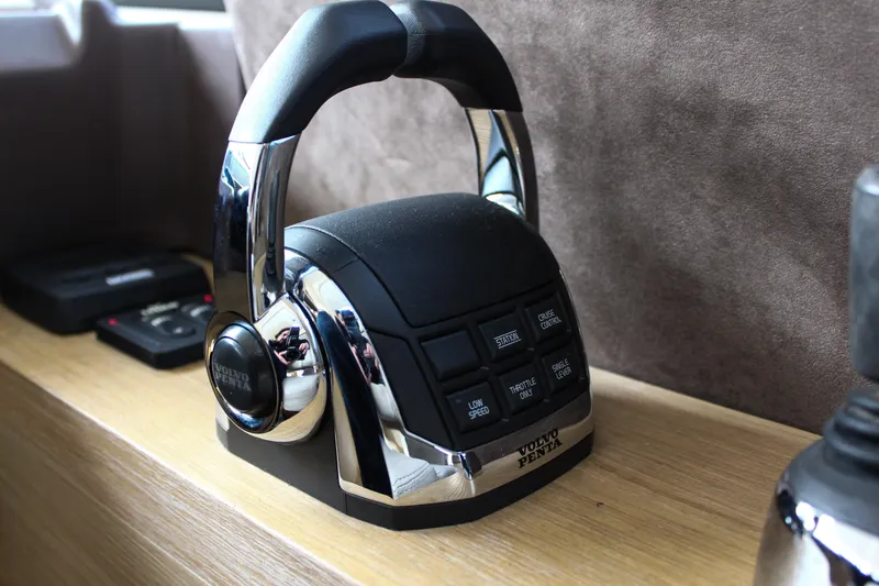 Oxygen Yacht Photos Pics Throttle control panel on 2016 Beneteau Monte Carlo 5 yacht, featuring sleek design and chrome accents.