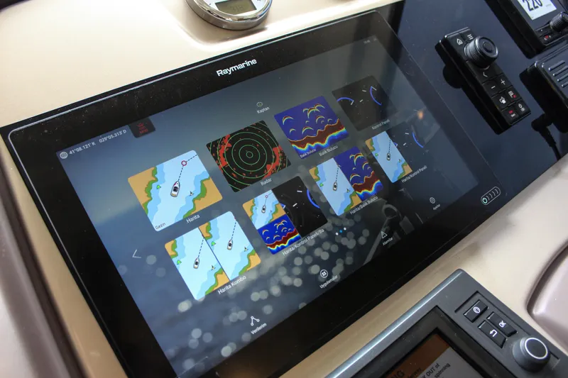 Oxygen Yacht Photos Pics Raymarine navigation display on 2016 Beneteau Monte Carlo 5 yacht dashboard.