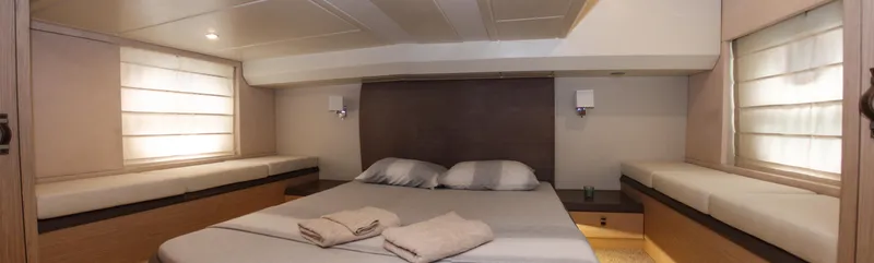 Oxygen Yacht Photos Pics Luxurious cabin interior of 2016 Beneteau Monte Carlo 5 yacht with cozy bedding.