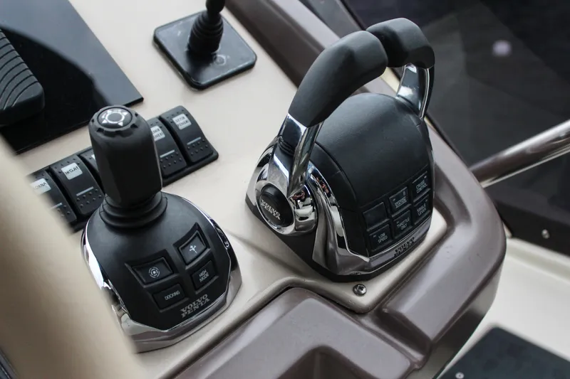 Oxygen Yacht Photos Pics Control panel of 2016 Beneteau Monte Carlo 5 yacht with joystick and throttle.