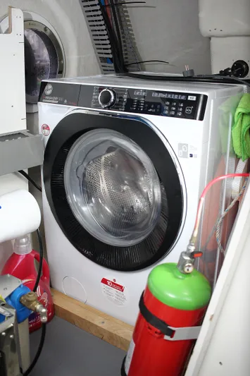 Oxygen Yacht Photos Pics Washing machine in 2016 Beneteau Monte Carlo 5 yacht interior.