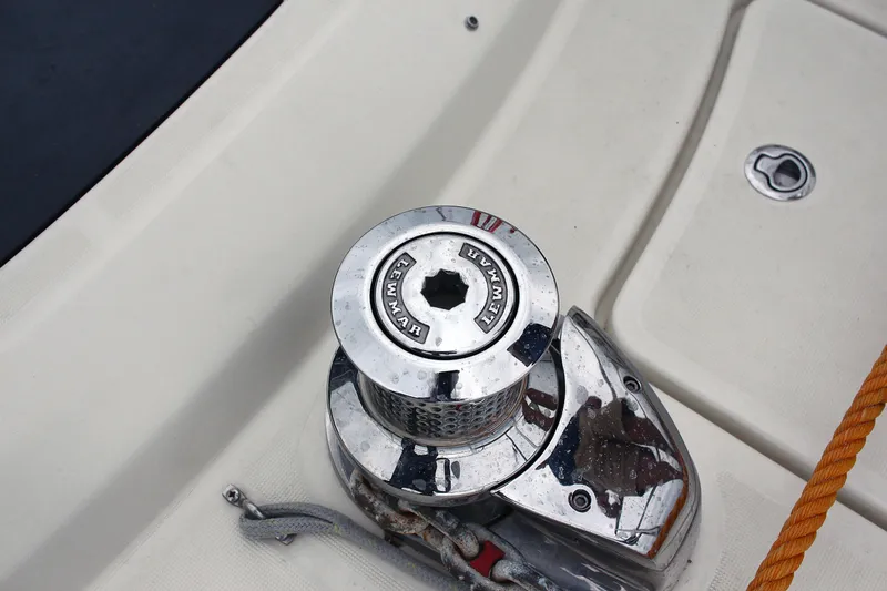 Oxygen Yacht Photos Pics Chrome winch on 2016 Beneteau Monte Carlo 5 yacht deck with rope.