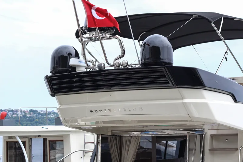 Oxygen Yacht Photos Pics 2016 Beneteau Monte Carlo 5 yacht with Turkish flag, docked at marina.