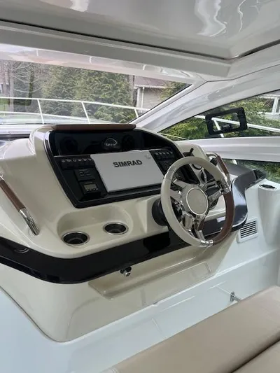  Yacht Photos Pics 2019 Beneteau Gran Turismo 40 helm with Simrad navigation system.