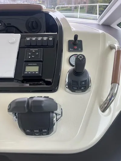  Yacht Photos Pics Control panel of a 2019 Beneteau Gran Turismo 40 yacht, featuring joystick and throttle controls.