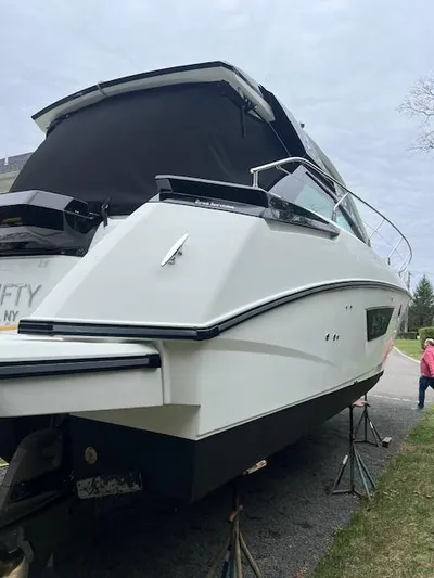  Yacht Photos Pics 2019 Beneteau Gran Turismo 40 yacht on stands, rear view, outdoors.