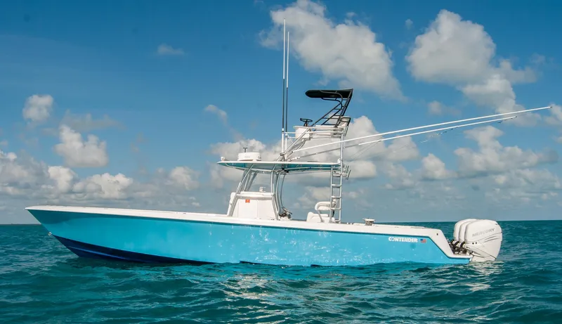 + Sea Keeper Yacht Photos Pics 2019 Contender 39 ST boat on open water under blue sky.