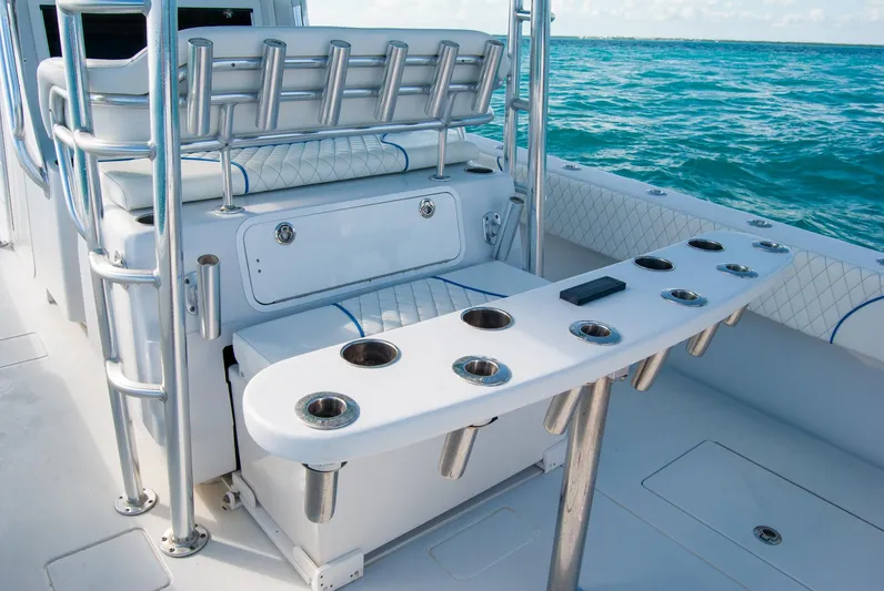 + Sea Keeper Yacht Photos Pics 2019 Contender 39 ST boat interior with rod holders, ocean view.
