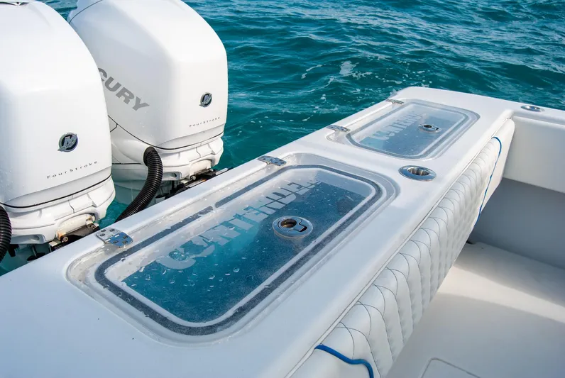 + Sea Keeper Yacht Photos Pics 2019 Contender 39 ST boat with dual Mercury engines on blue water.