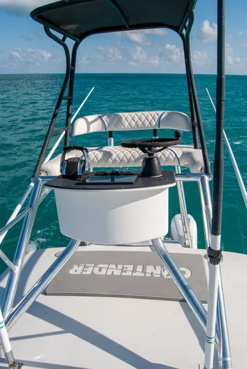 + Sea Keeper Yacht Photos Pics 2019 Contender 39 ST boat helm with ocean view and clear skies.