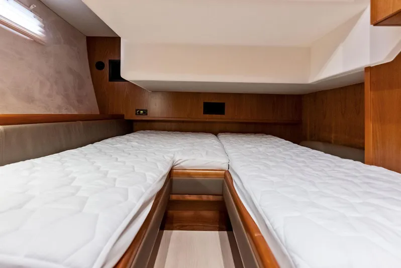 Southwind Yacht Photos Pics Twin beds in the cabin of a 2021 Moody 45 DS yacht.