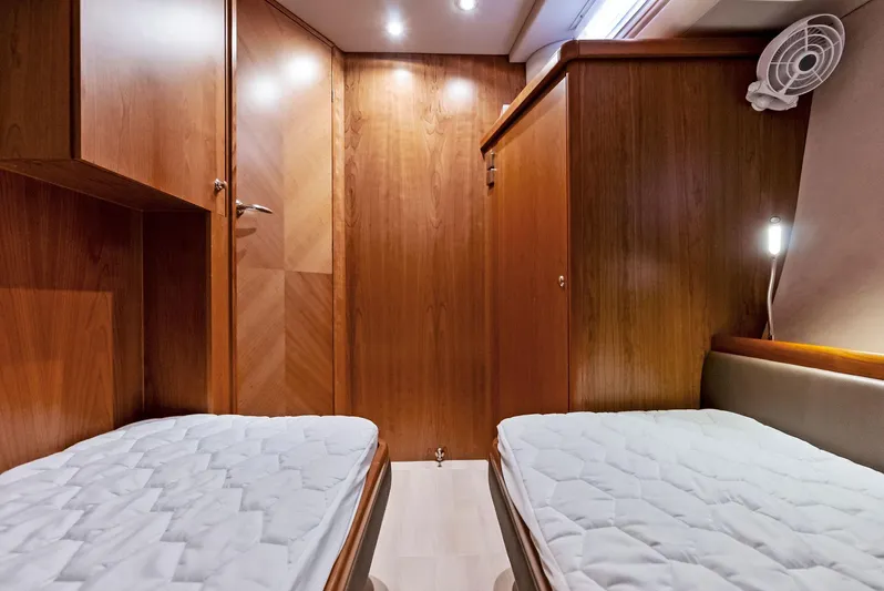 Southwind Yacht Photos Pics Interior cabin of 2021 Moody 45 DS yacht with twin beds and wooden finish.