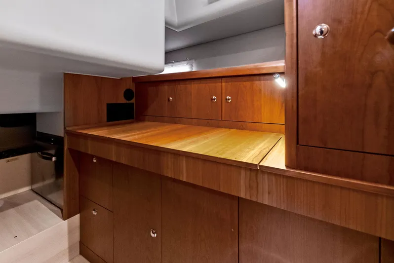 Southwind Yacht Photos Pics Interior of 2021 Moody 45 DS yacht with wooden cabinetry and ample storage.