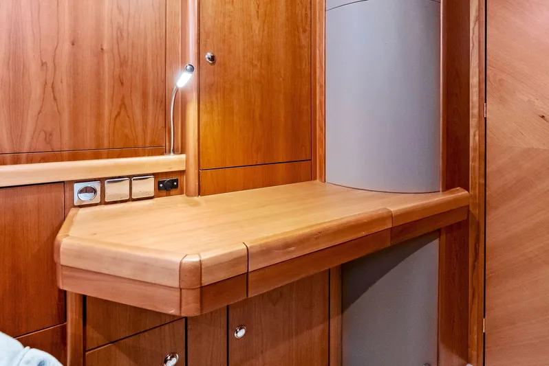Southwind Yacht Photos Pics Wooden interior desk area in a 2021 Moody 45 DS yacht.