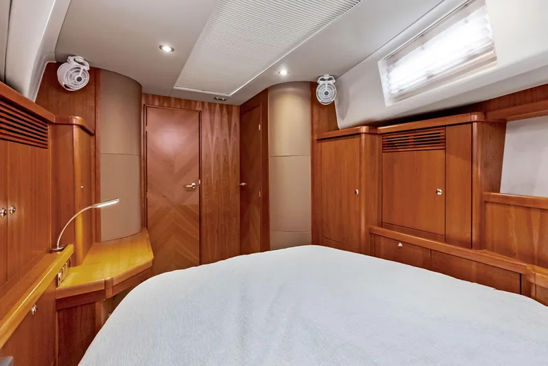 Southwind Yacht Photos Pics Luxurious cabin interior of 2021 Moody 45 DS yacht with wooden furnishings.