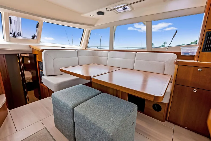 Southwind Yacht Photos Pics Modern interior of 2021 Moody 45 DS yacht with spacious dining area.