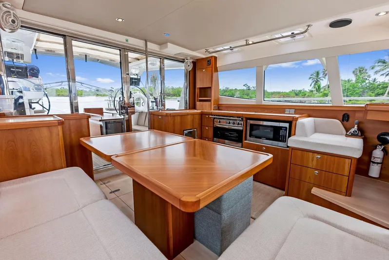 Southwind Yacht Photos Pics Interior of 2021 Moody 45 DS yacht with modern kitchen and dining area.