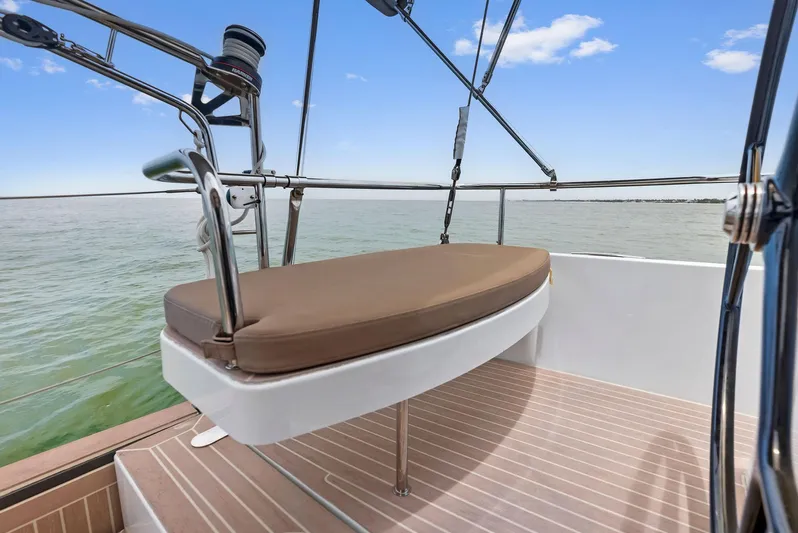 Southwind Yacht Photos Pics Moody 45 DS 2021 yacht deck with cushioned seating and ocean view.