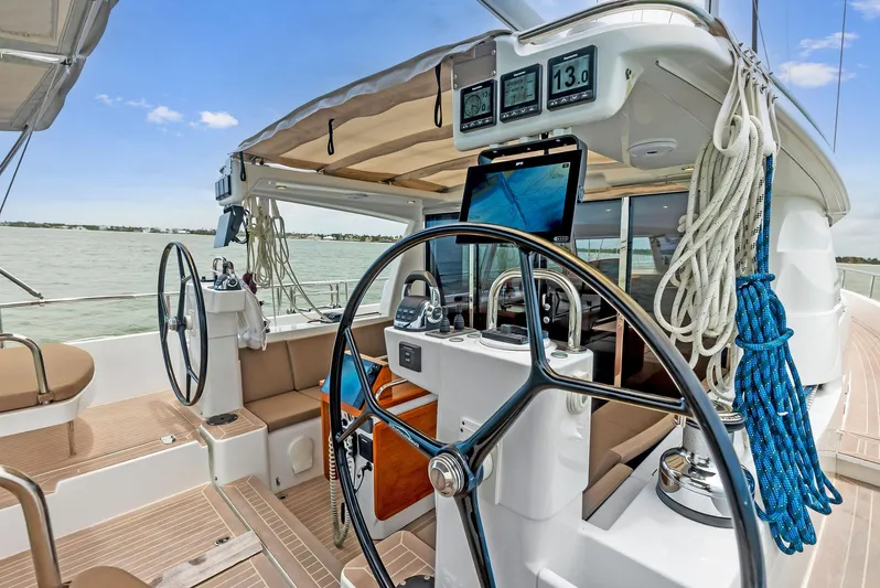 Southwind Yacht Photos Pics Cockpit of 2021 Moody 45 DS sailboat with dual steering wheels and navigation instruments.