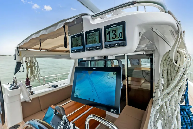 Southwind Yacht Photos Pics Cockpit of 2021 Moody 45 DS sailboat with navigation instruments and touchscreen display.