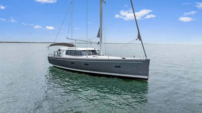 Southwind Yacht Photos Pics 2021 Moody 45 DS sailboat on calm waters under a clear blue sky.