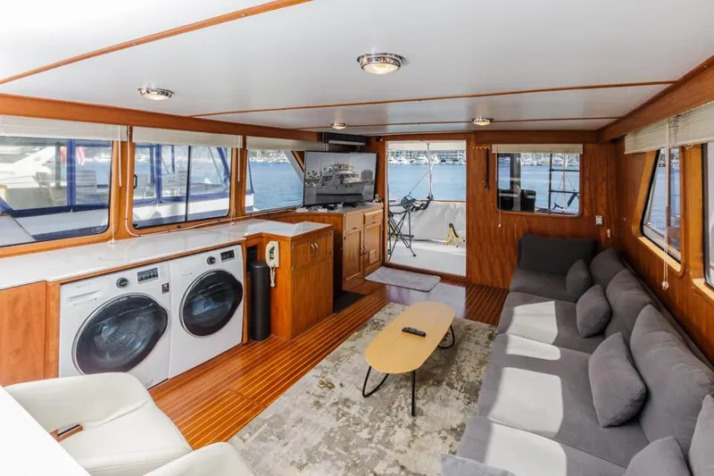 Betelgeuse Yacht Photos Pics Interior of 1988 DeFever 53 POC yacht with modern amenities and waterfront view.