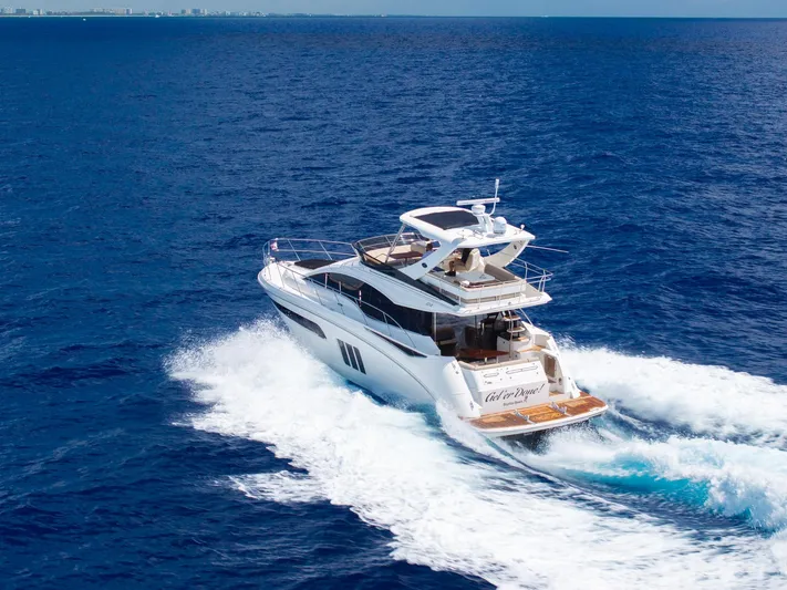 Get'er Done! Yacht Photos Pics 2016 Sea Ray 510 Fly yacht cruising on open blue water.