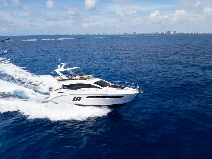 Get'er Done! Yacht Photos Pics 2016 Sea Ray 510 Fly yacht cruising on open water.