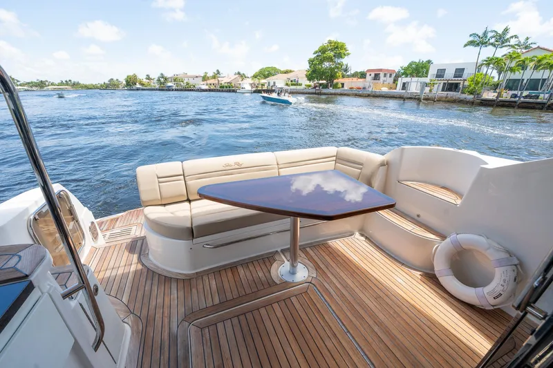 Get'er Done! Yacht Photos Pics 2016 Sea Ray 510 Fly yacht with teak deck and waterfront view.