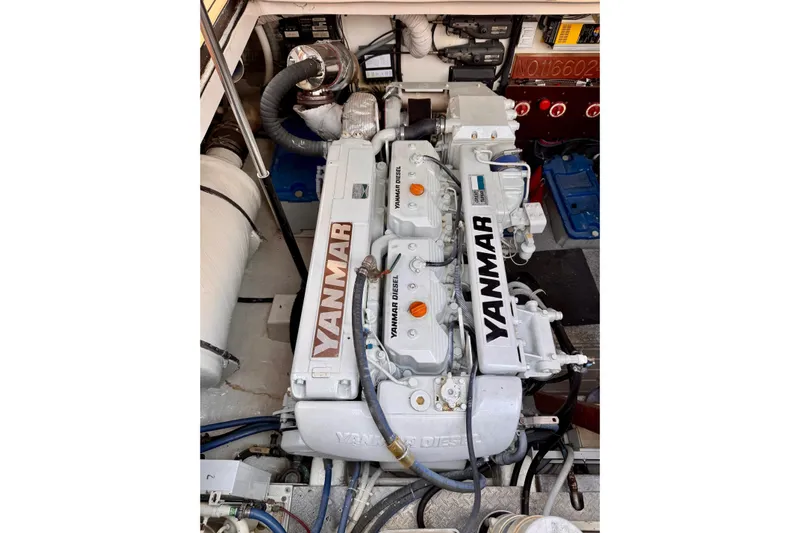Necessity Yacht Photos Pics Engine compartment of 2005 Albin 45 Command Bridge with Yanmar diesel engine.