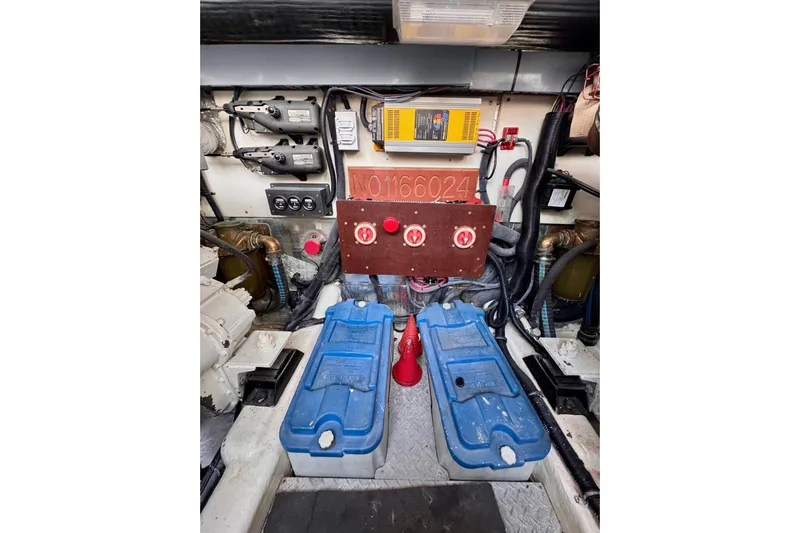 Necessity Yacht Photos Pics Engine room of 2005 Albin 45 Command Bridge with equipment and wiring.