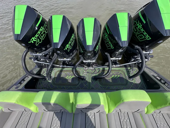  Yacht Photos Pics Four powerful outboard engines on a 2022 Midnight Express 43' Solstice boat.