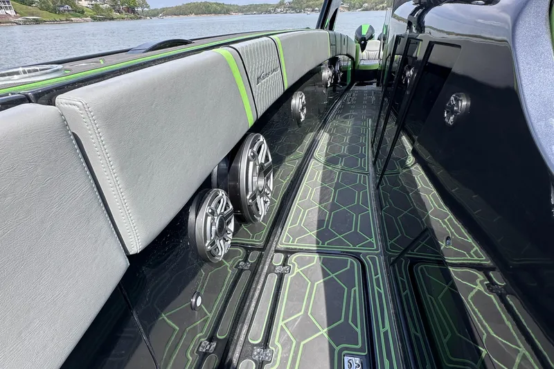  Yacht Photos Pics 2022 Midnight Express 43' Solstice boat interior with stylish seating and modern speaker system.