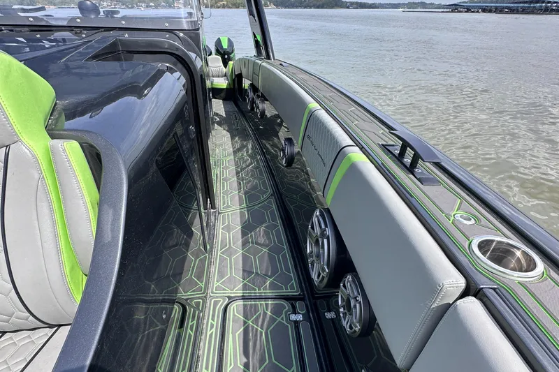  Yacht Photos Pics 2022 Midnight Express 43' Solstice boat interior with sleek design and green accents on water.
