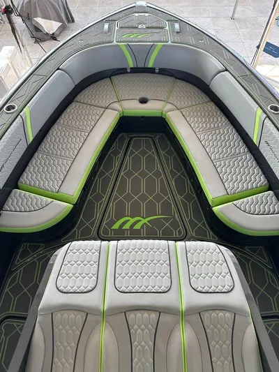  Yacht Photos Pics Luxury seating on 2022 Midnight Express 43' Solstice boat with modern design and green accents.