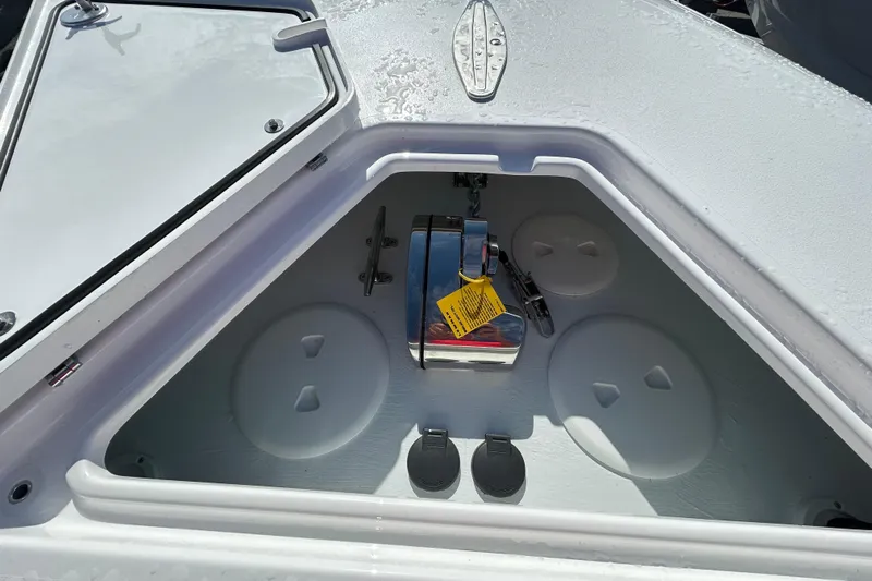  Yacht Photos Pics Open storage compartment on 2026 Contender 35 ST boat, showcasing interior features.