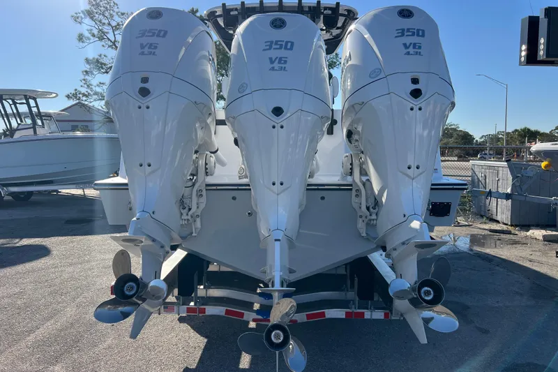  Yacht Photos Pics 2026 Contender 35 ST boat with triple 350 V6 outboard engines, rear view.
