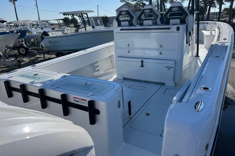  Yacht Photos Pics 2026 Contender 35 ST boat interior with seating and storage compartments.