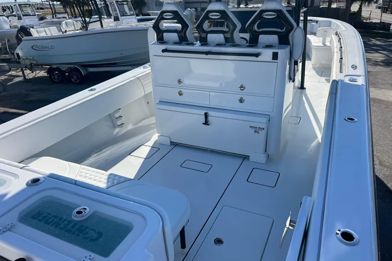  Yacht Photos Pics 2026 Contender 35 ST boat interior with seating and storage compartments.