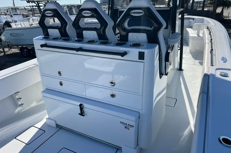  Yacht Photos Pics 2026 Contender 35 ST boat interior with seating and storage compartments.