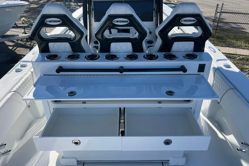  Yacht Photos Pics 2026 Contender 35 ST boat interior with seating and storage compartments.