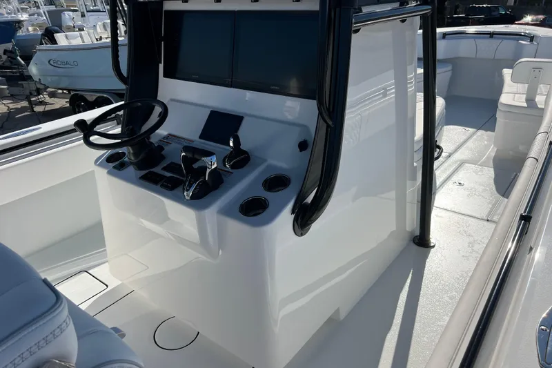  Yacht Photos Pics 2026 Contender 35 ST boat cockpit with modern steering and controls.