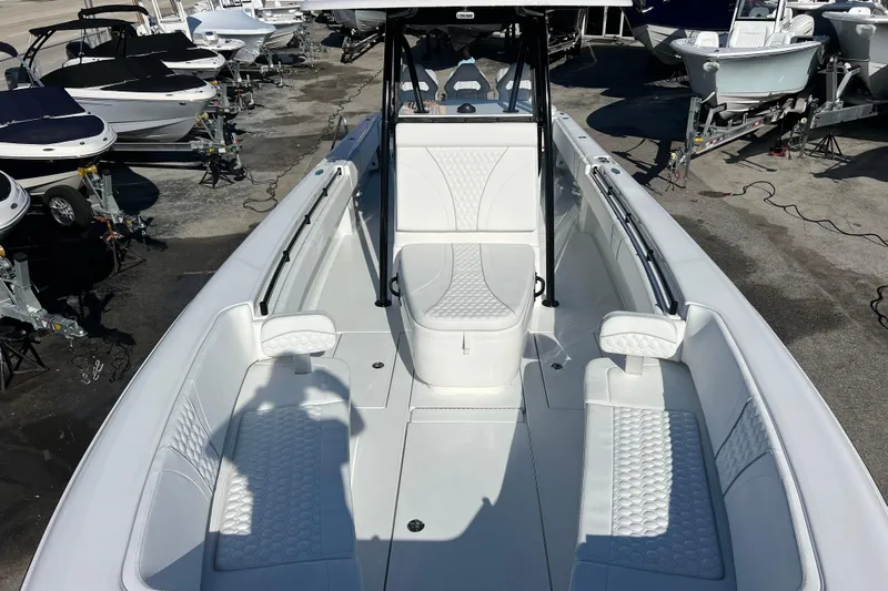  Yacht Photos Pics 2026 Contender 35 ST boat interior with white seating and sleek design.